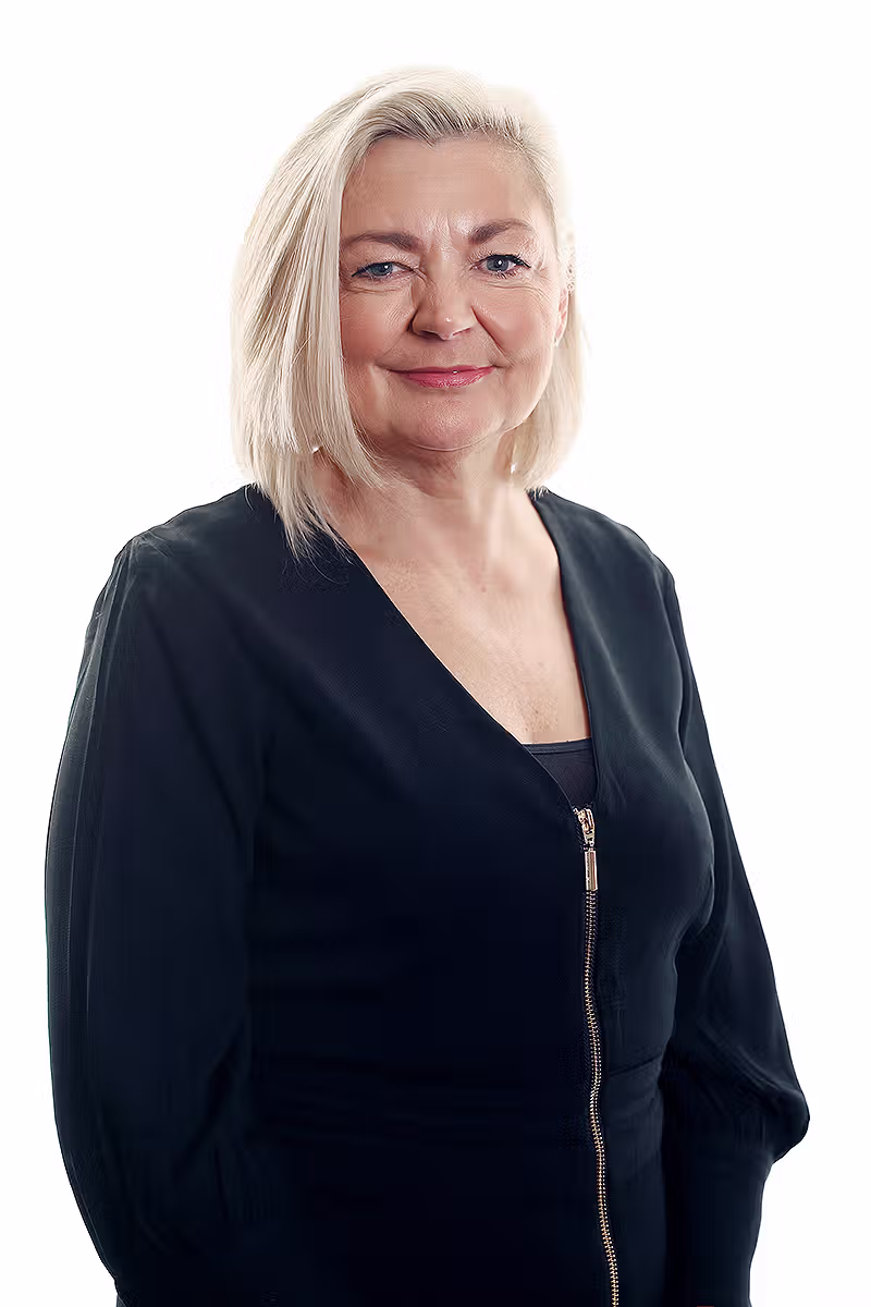 Senior professional headshot on a white background for business profile photography