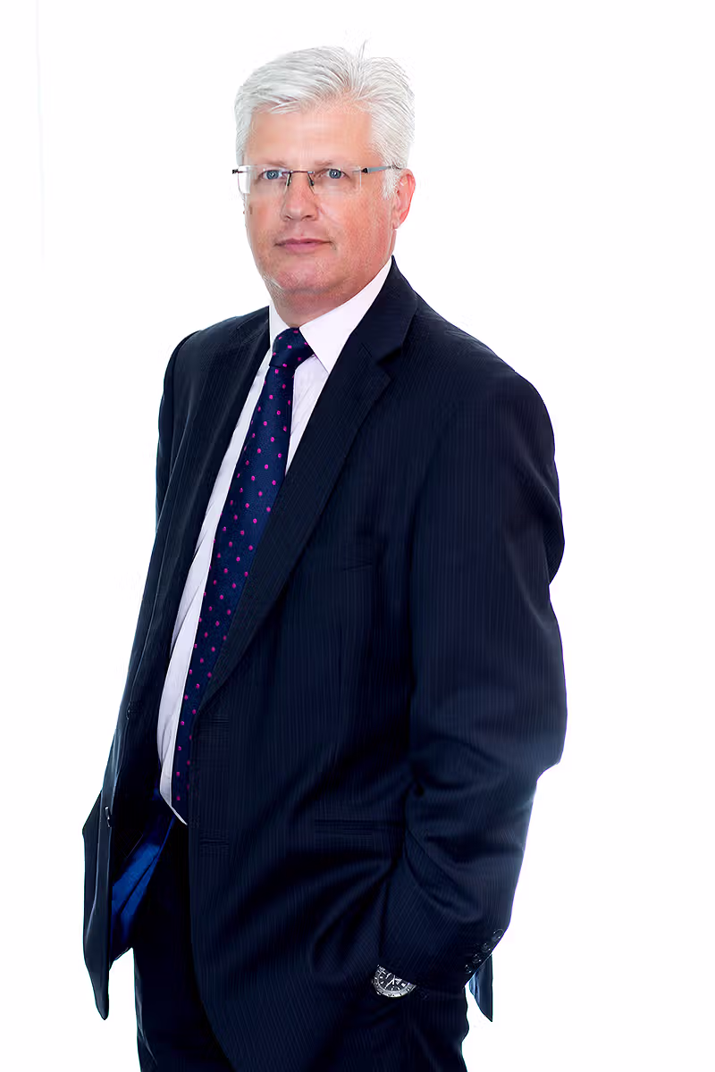 Senior leadership portrait on a white background for corporate profile use