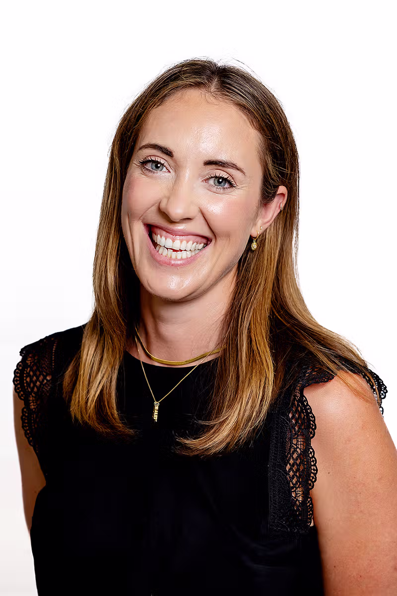 Professional headshot on a white background for corporate profile and staff photography use