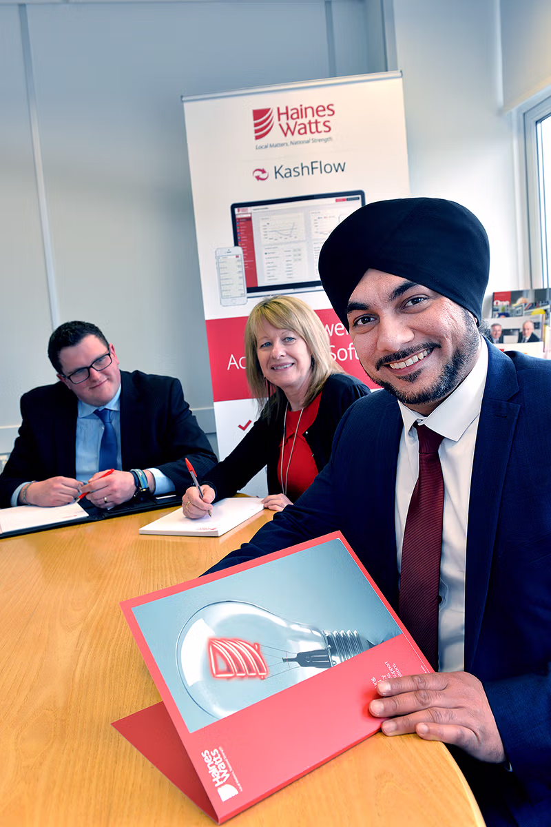 Internal communications style meeting portrait in a business office