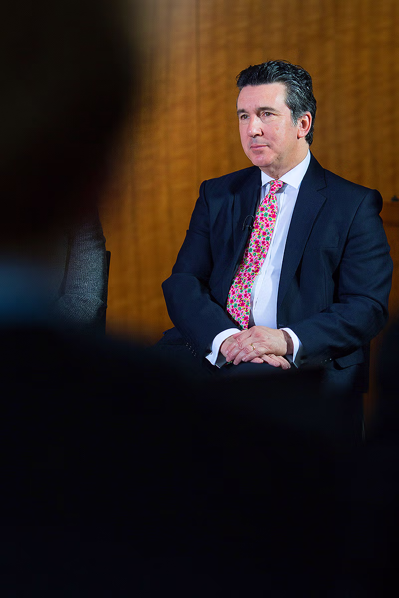 Internal communications style seated executive portrait in an office setting