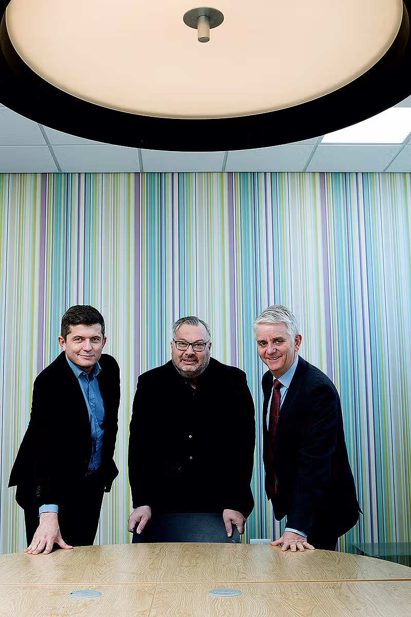 Corporate boardroom team portrait of business leaders in a modern office interior