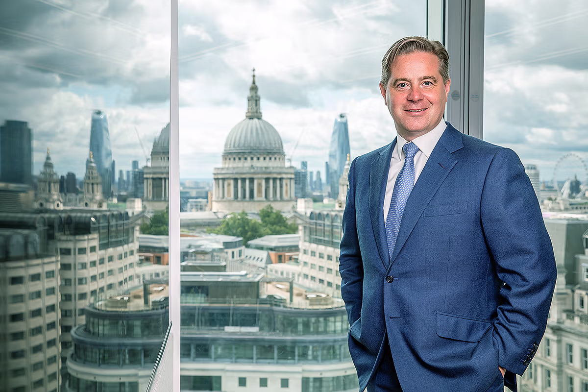 Corporate portrait of Mark Duckworth, CEO of Schroders Personal Wealth, photographed at 1 London Wall Place with St Paul’s Cathedral and the City skyline behind