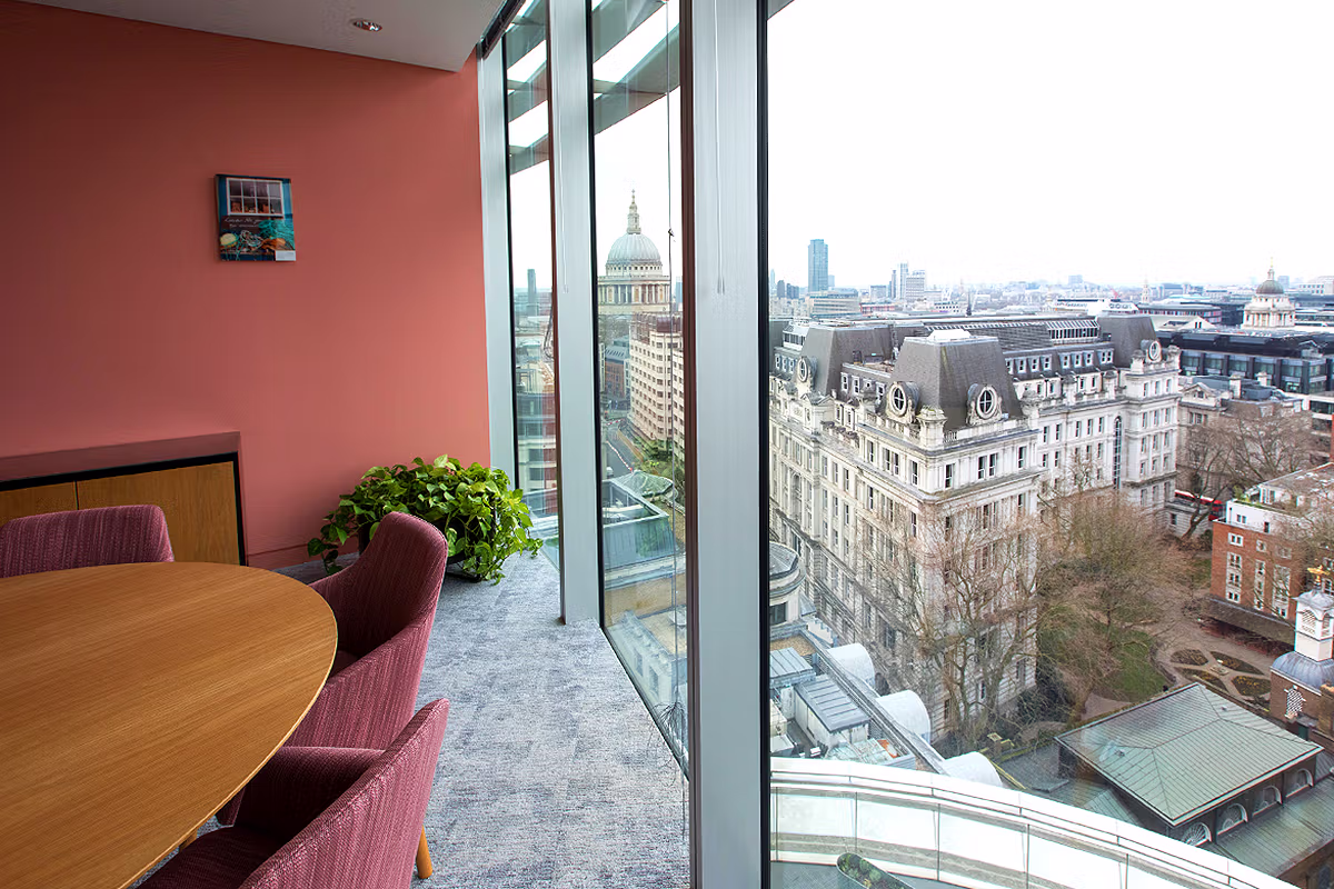 Meeting room at Schroders Personal Wealth, 1 London Wall Place, London EC2Y 5AU, with St Paul's Cathedral visible through the window in the City of London