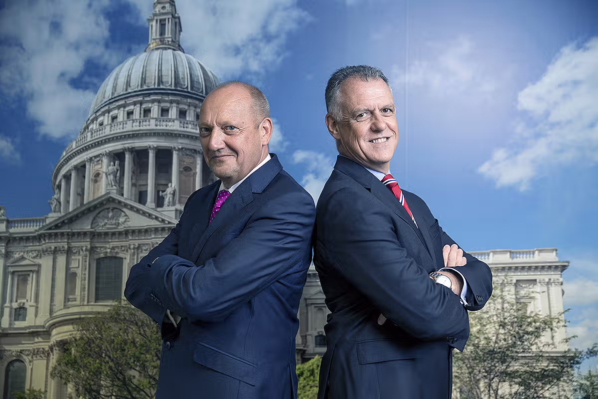 Executive portrait of two businessmen on a London rooftop with St Paul's Cathedral behind