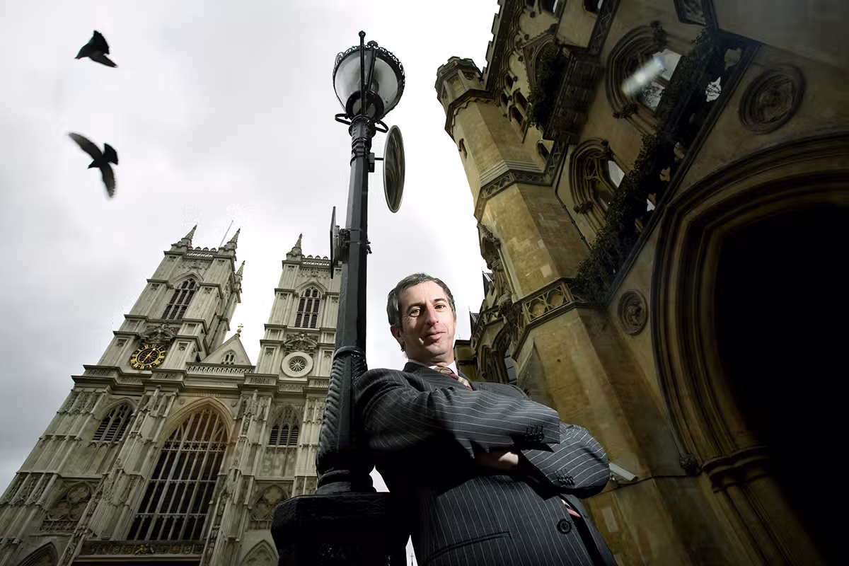 Low-angle corporate portrait outside Westminster Abbey in London