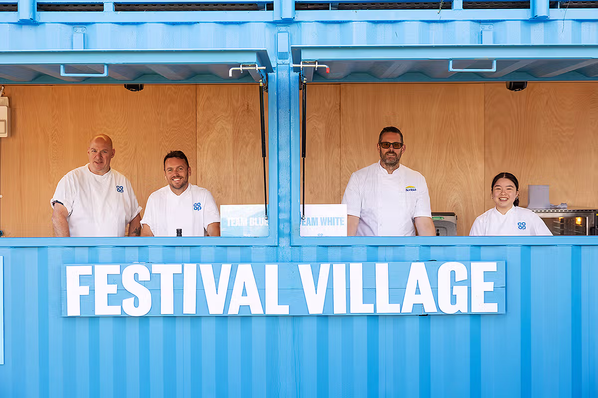 PR Photographer London coverage for Co-op Food Festival showing chefs inside the branded Festival Village at Potters Fields Park beside Tower Bridge